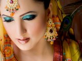 pakistani bridal makeup on yellow dress